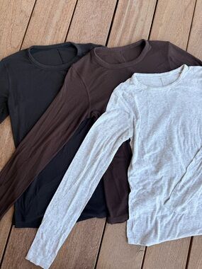 Bundle of Lululemon Hold Tight Long Sleeve Tee in Black, Gray, Brown